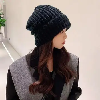 2022 nova pilha chapéu chapéu de lã para as mulheres de inverno grande coreano versão Japonesa casal de estudantes Shishangbao Quente tampa de ouvido
